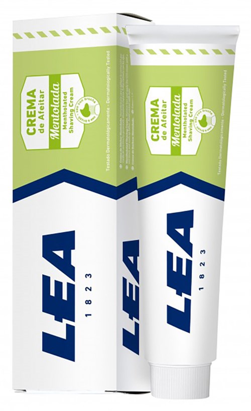 Een tube crème en de doos met groen, wit en blauw, gelabeld in het Spaans en vermeldt natuurlijke ingrediënten.