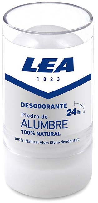 Een cilindervormige witte container met doorzichtig deksel, gelabeld als natuurlijke aluminium deodorant, die 24 uur meegaat.