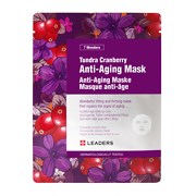 Ett paket med anti-aging-mask med lingon och blommor på lila bakgrund, med text som beskriver produkten.