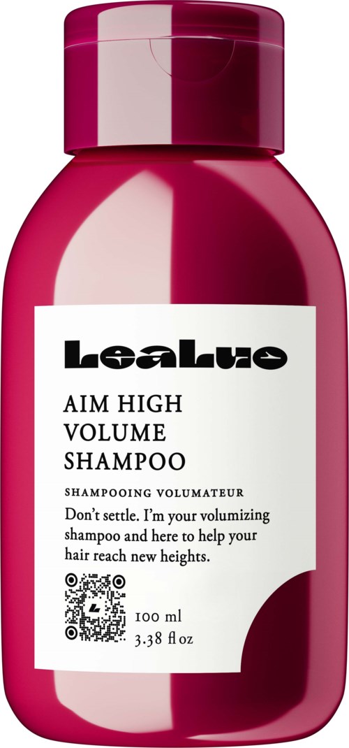 A pink bottle of Lealuxe Aim High Volume Shampoo with a white label and black text. Small QR code on label.