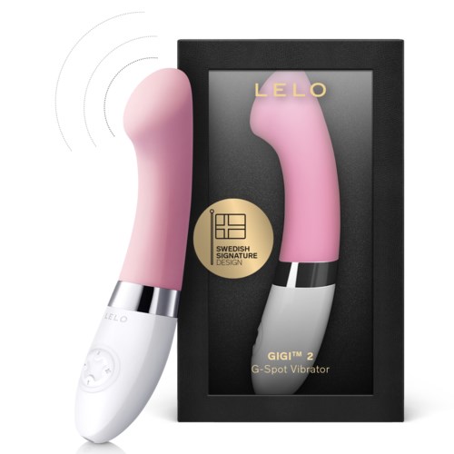 Pink G-Spot vibrator with white handle, black metal ring, and packaging box labeled 'LELO GIGI.'