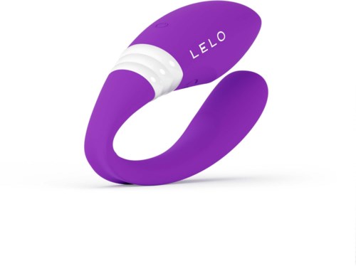 Violetti ja valkoinen rannerengasmuotoinen laite LELO-merkillä.