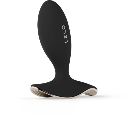 A black curved device with the word LELLO on it, resting on a metallic base.