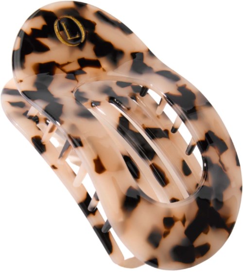 A tortoise shell patterned hair clip with a gold 'L' logo at the top.