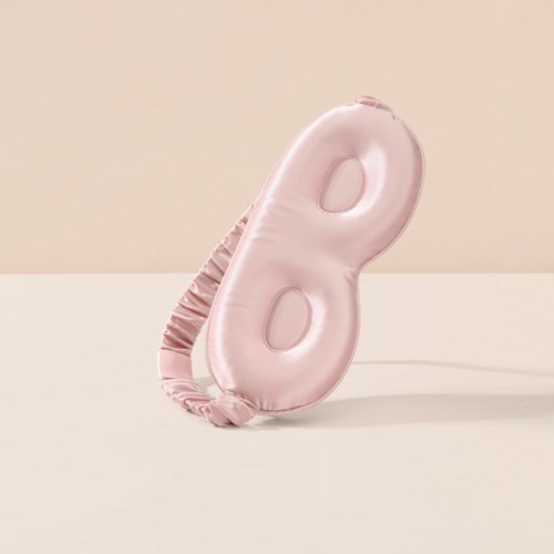 Ett rosa uppblåsbart ballongformat nummer 8 med snöre nedtill.