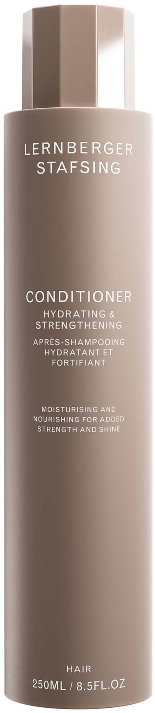 A tall, beige bottle of LERNBERGER STAFSING conditioner with white text for hair hydration and strengthening.
