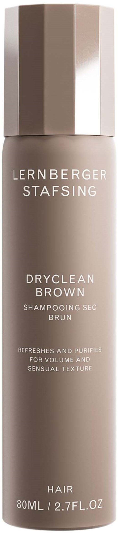 A tall, beige bottle with a metallic cap labeled 'Lernberger Stafsing Dryclean Brown Shampoo' for hair.