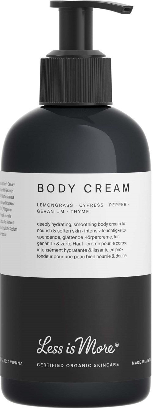 A black body cream bottle with a pump, white label, and brand name 'Less is More'.