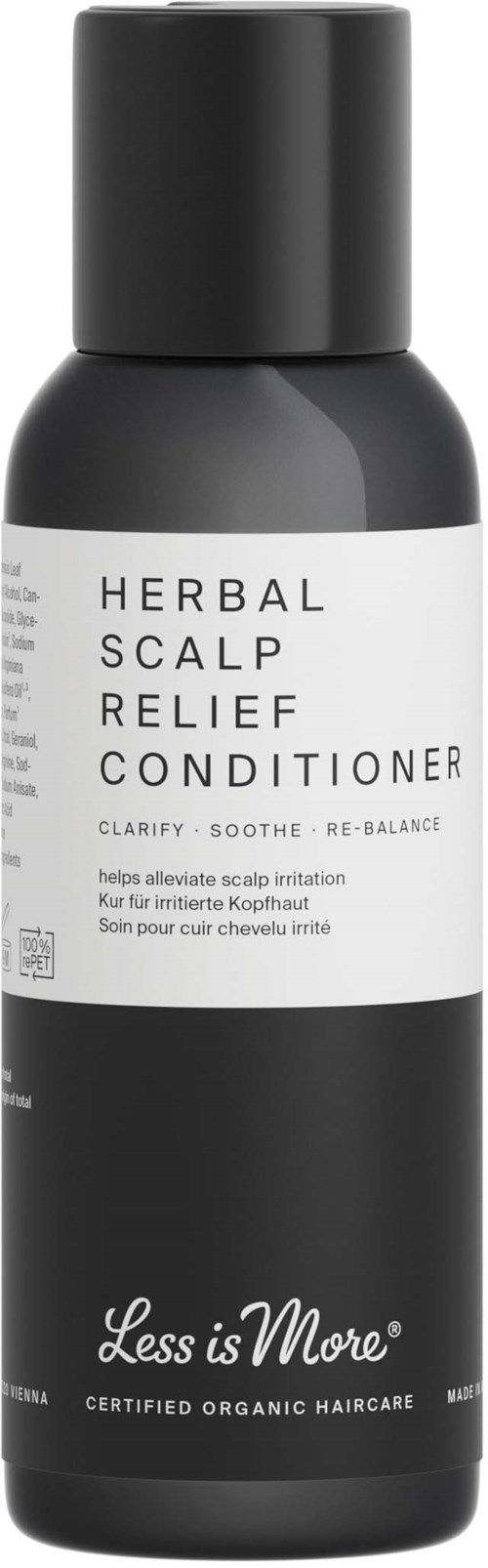 En svart flaske merket 'Herbal Scalp Relief Conditioner' for å lindre hodebunnsirritasjon, merket 'Less is More'.