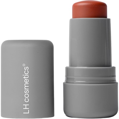 Een grijze lippenstiftverpakking met een gedeeltelijk zichtbaar perzikkleurig lippenstift. De verpakking staat rechtop, en de dop heeft de tekst LH cosmetics.