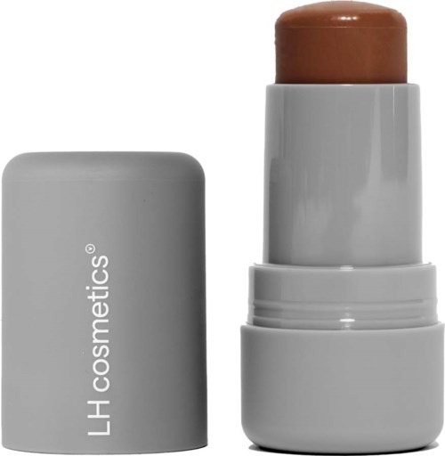 Een grijze tube met de woorden "LH cosmetics" naast een grote, bruingekoppelde stick, waarschijnlijk een cosmetisch product.