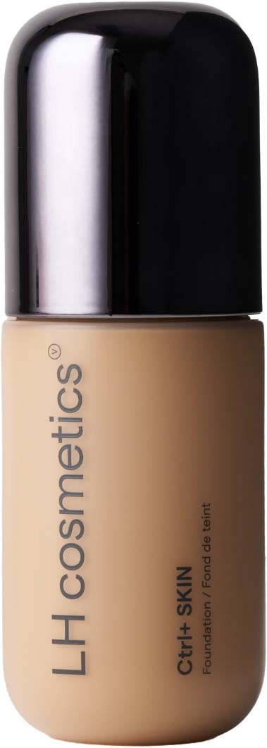 En flaske foundation med sort låg og beige krop, mærket LH Cosmetics og til følsom hud.