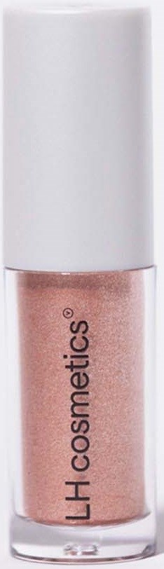 A small bottle of pinkish cosmetic product with a white cap, labeled 'LH Cosmetics.'
