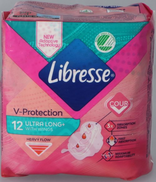 Rosa och blå förpackning av Libresse-skydd med vingar, med text om skydd och absorptionszoner.