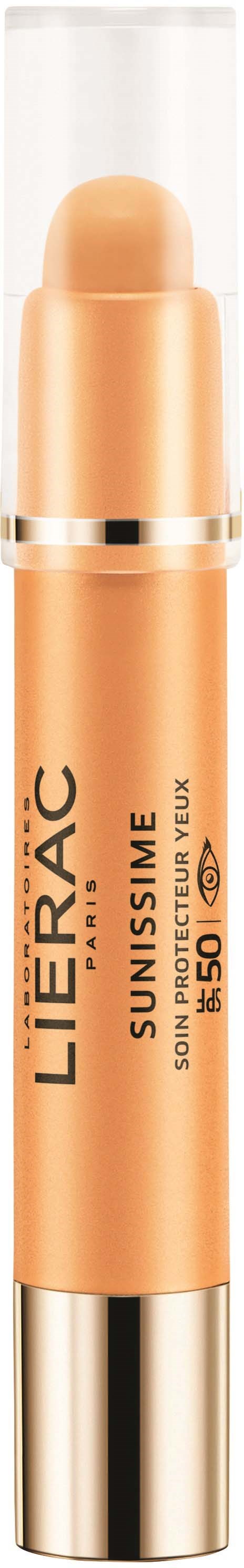 A beige stick with a golden cap and text, used for sun protection on skin.
