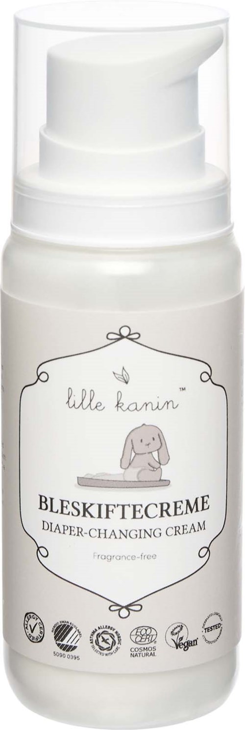 A white bottle with a pump, labeled 'Bleskiftcreme' for diaper-changing, with a cute bunny illustration and certification icons.