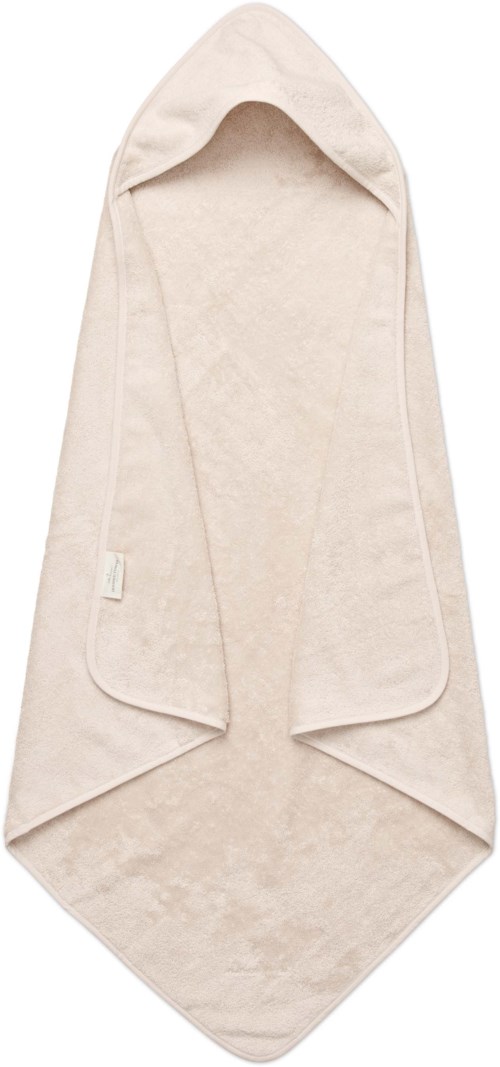 Ett mjukt, beige huvad badlakan med en lång, spetsig ände, för torkning efter bad eller simning.