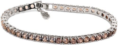 Een zilveren en roségouden armband met sprankelende stenen gelijkmatig verdeeld over de band.