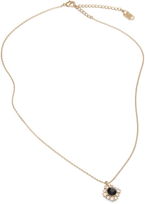 Ett halsband med en rund svart sten och klar omgivande kristaller på en tunn kedja.