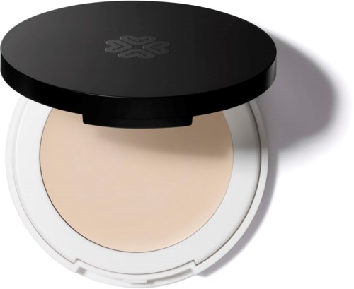 A compact powder case with a beige powder and a black lid with a logo.