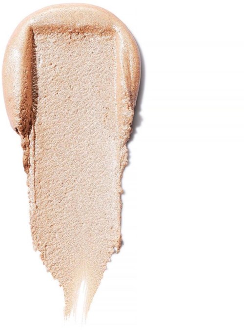 Beigefarvet pressed pudderfoundation med noget løspudder nedenfor.