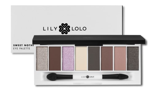Paleta cieni do powiek z sześcioma kolorami i małym pędzelkiem w białym pudełku z czarnym i fioletowym tekstem.