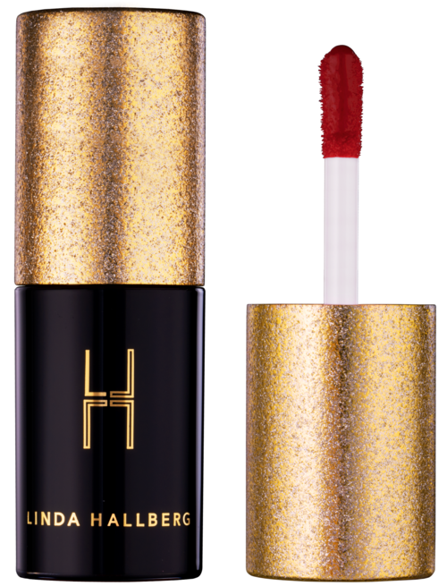 Ein Lippenstift mit goldener Kappe und schwarzem Boden, zeigt einen roten LippenGloss-Applikator.