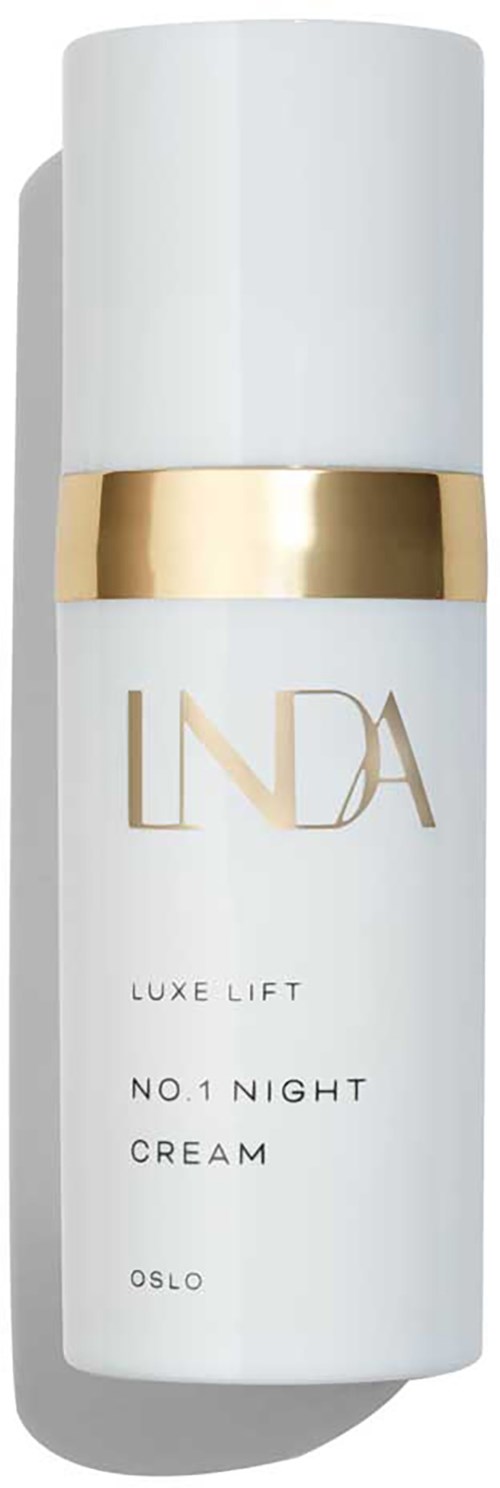 Hvit flaske med gullbånd, merket 'LINDA,' 'Luxe Lift,' 'No.1 Night Cream,' og 'Oslo.'