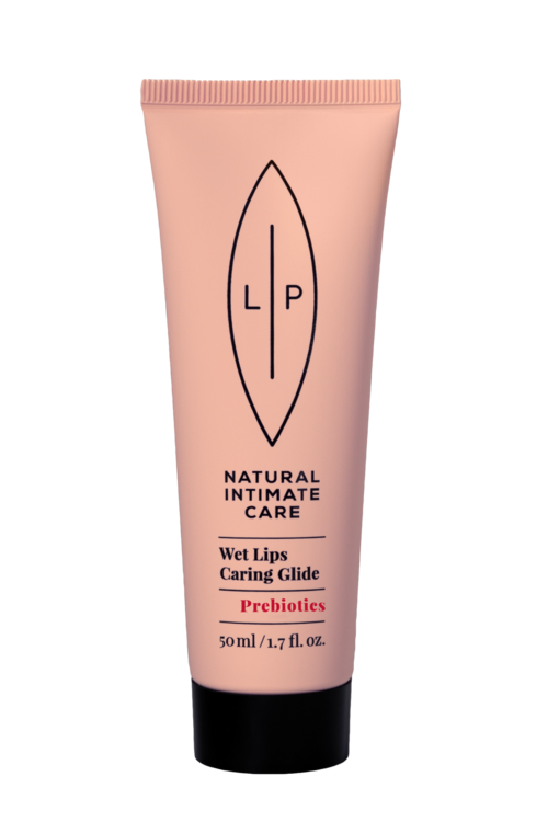 Pink tubes med lip balm mærket 'Natural Intimate Care, Wet Lips Caring Glide, Prebiotics, 50ml.'