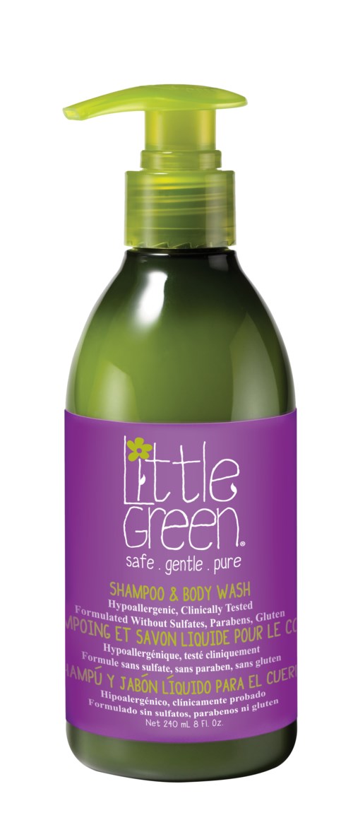 Grønn flaske med lilla etikett og grønt pumpehod, merket 'LittleGreen' sjampo og kroppsvask for barn.