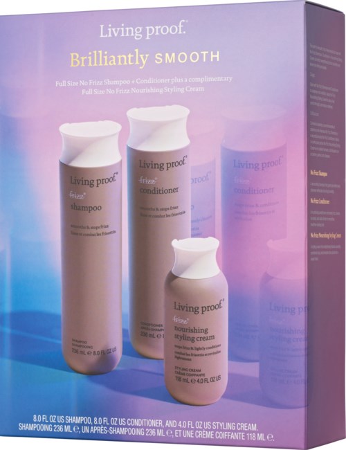 A box contains three bottles for hair care: shampoo, conditioner, and styling cream, with purple and white colors on the packaging.