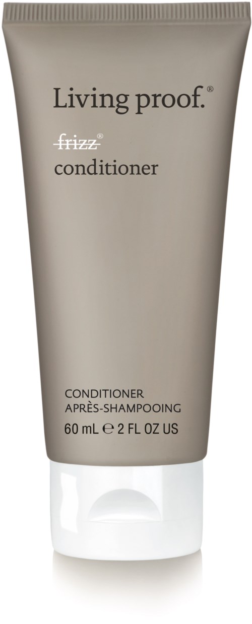 En beige tub med Living Proof Frizz Conditioner, 60 ml, med en vit lock i botten.