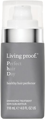 Szara butelka z białą pompką, oznaczona "Living proof. Perfect hair day," do pielęgnacji włosów.