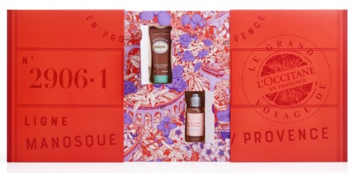 Ett presentset med L'Occitane-produkter med färgglada illustrationer, röd förpackning och text på franska och engelska.