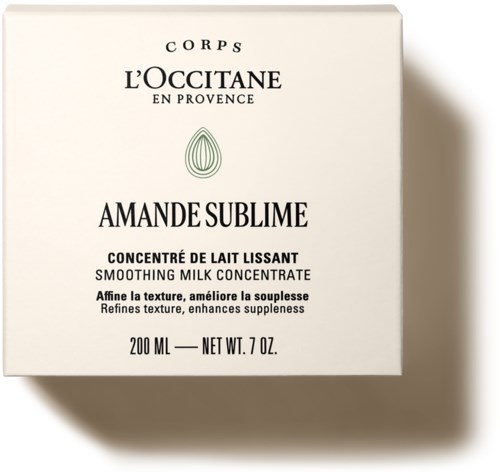En hvid boks med L'Occitane nærende smeltende mælkecreme med sort tekst og en simpel bladlogo.