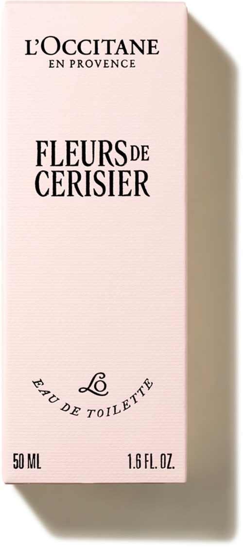 En rosa förpackning med svart text som visar en parfym som heter Fleurs de Cerisier av L'Occitane, med storleksuppgifter.