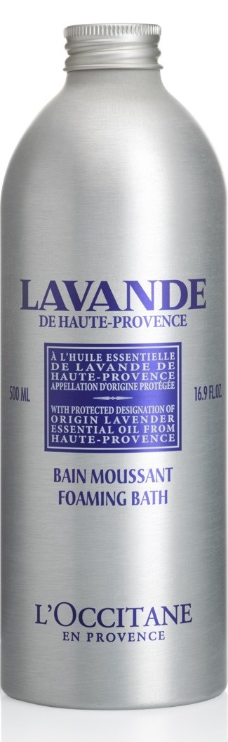 En silverfärgad flaska märkt Lavande, L'Occitane, innehåller lavendeldoftande skumbad, 300 ml.