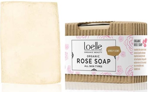 En tvålstav och en box med Loelle ekologisk rosenlotion med rosa blomsterdesign.