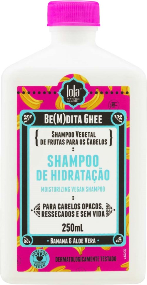 En vit flaska med återfuktande veganshampoo för hår, med rosa lock och färgglad etikett som nämner banan och aloe vera.
