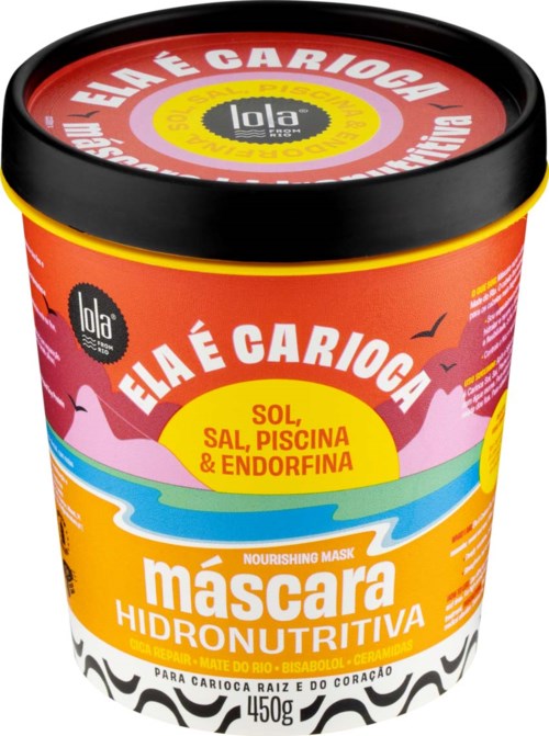 En färgglad förpackning av en näringsrik hårmask med etiketter om produkten och dess ingredienser.