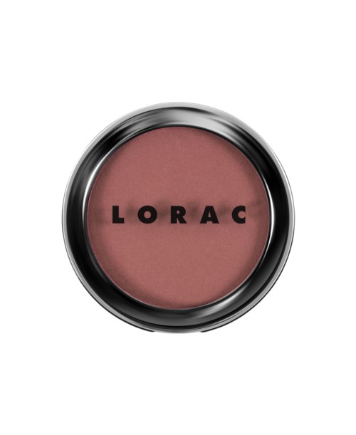 Et rundt sminkeprodukt merket 'LORAC' med en pinkish-brun nyanse inni.
