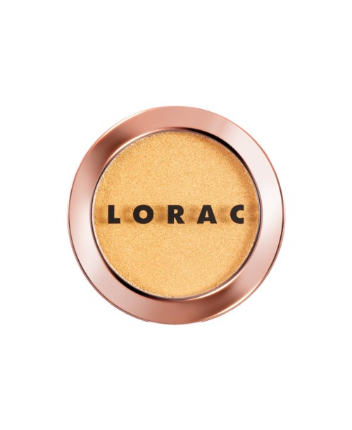 Et rundt sminkeprodukt med rosa innfatning og gulaktig inne, med ordet 'LORAC' skrevet på det.