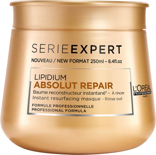 Guldfärgad burk med hårmask märkt 'LIPIDIUM ABSOLUT REPAIR' från L'Oréal. Den är för professionellt bruk.