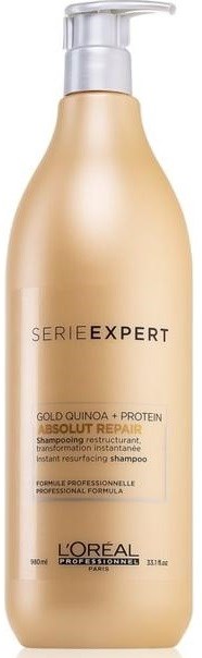 En beige schampoflaska med pump, märkt 'Serie Expert' och 'Gold Quinoa + Protein'.