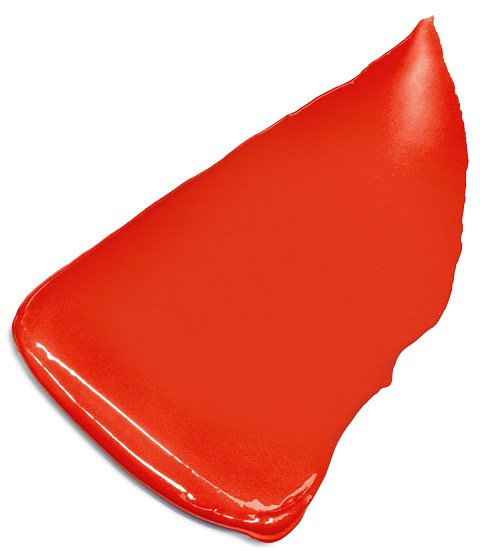 Ein roter Plastikstuhl mit geschwungener Form und glatter Oberfläche. Der Rücken ist hoch und leicht geneigt.