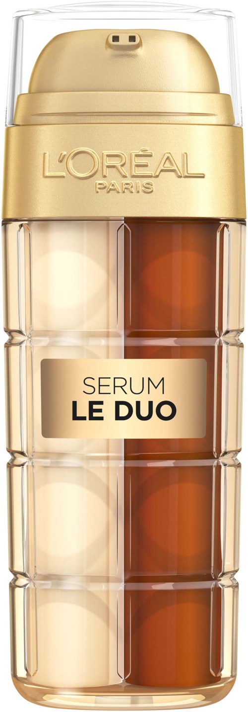 En guldfärgad och genomskinlig hudvårdsflaska med fack, märkt L'Oreal Paris och Serum Le Duo.