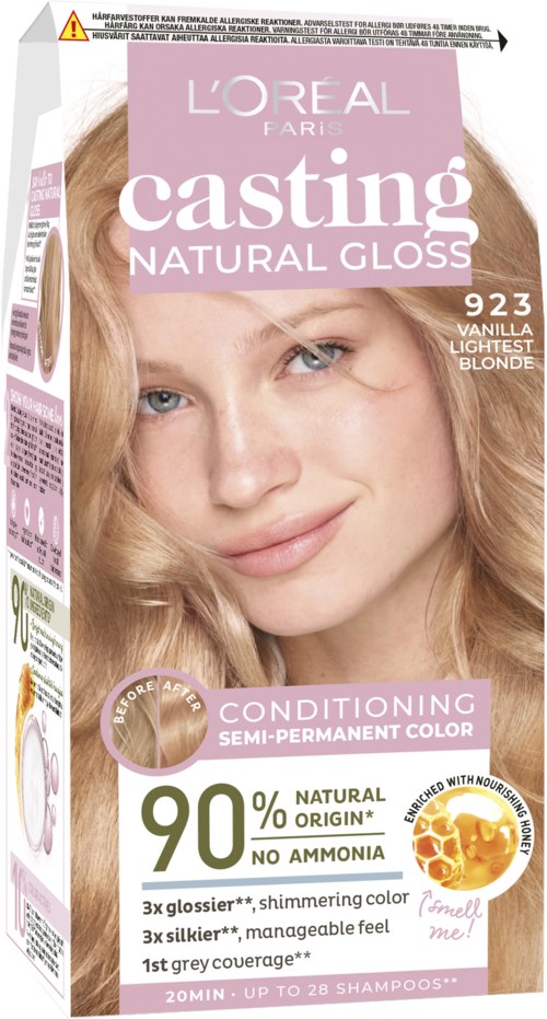 En förpackning av L'Oréal casting natural gloss hårfärg i vaniljblond. Den betonar 90 % naturliga ingredienser och vårdande egenskaper.