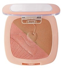 A makeup compact with powder in two shades, in a pink case with mirror. The shades are light and darker pink.
