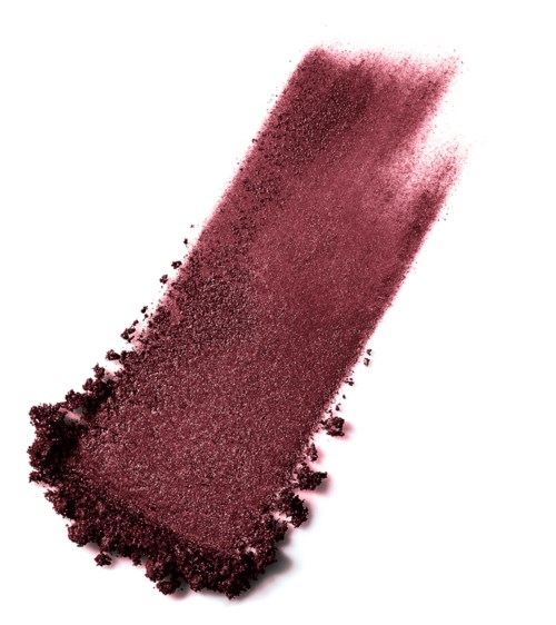 Pink powder spilled on a white surface, forming a rectangular shape with a gradient effect.