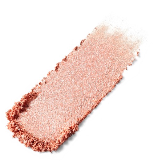 A peach-colored makeup sponge with a rounded rectangular shape and a rough, textured edge.